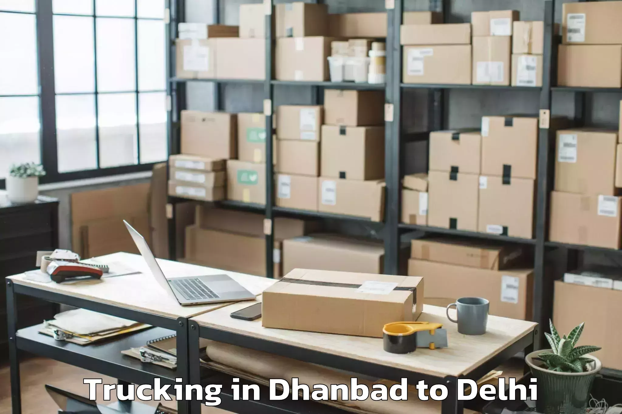 Dhanbad to Parsvnath Mall Inderlok Trucking Booking